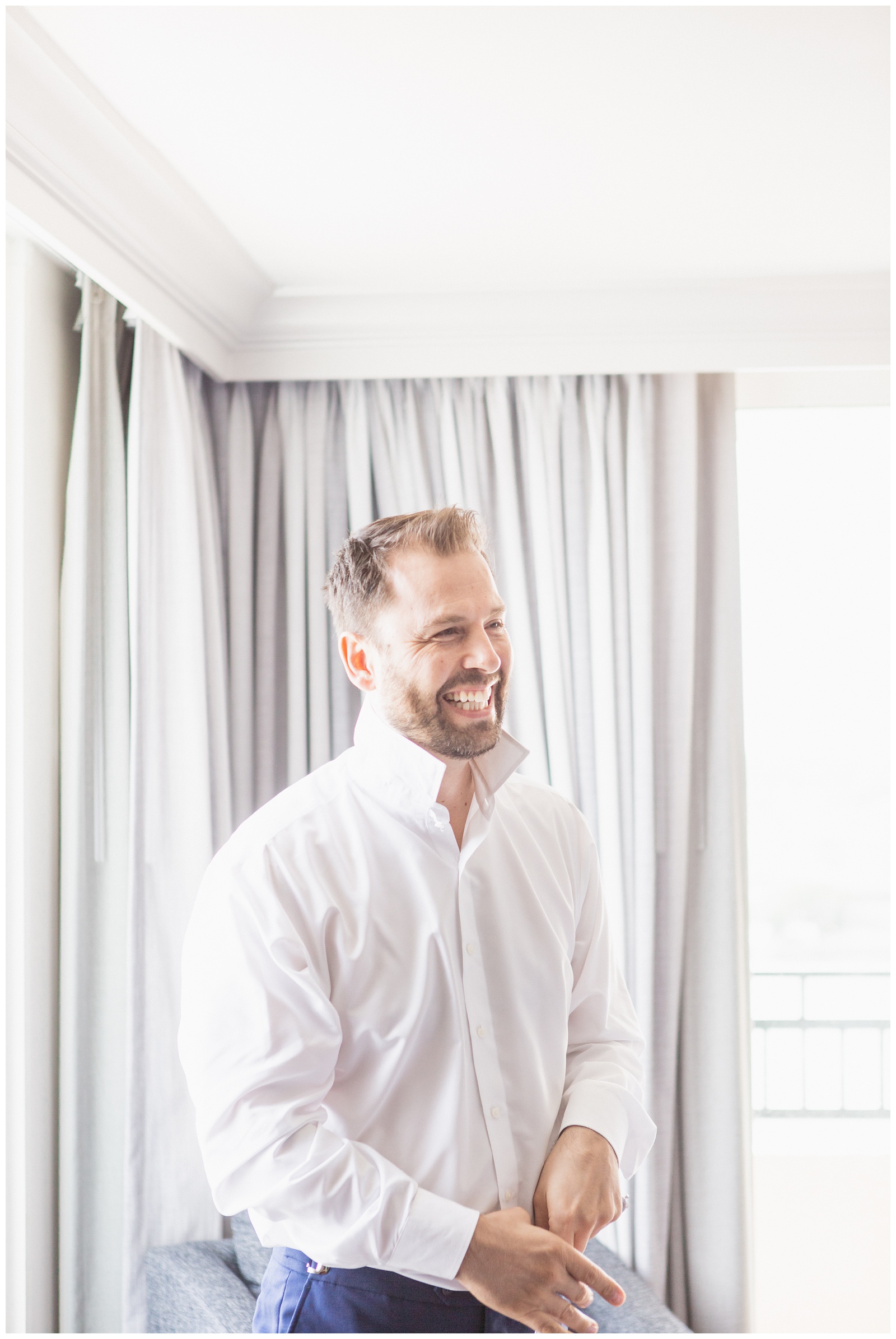 Groom getting ready at Tampa Waterside hotel | Matlock and Kelly Photography