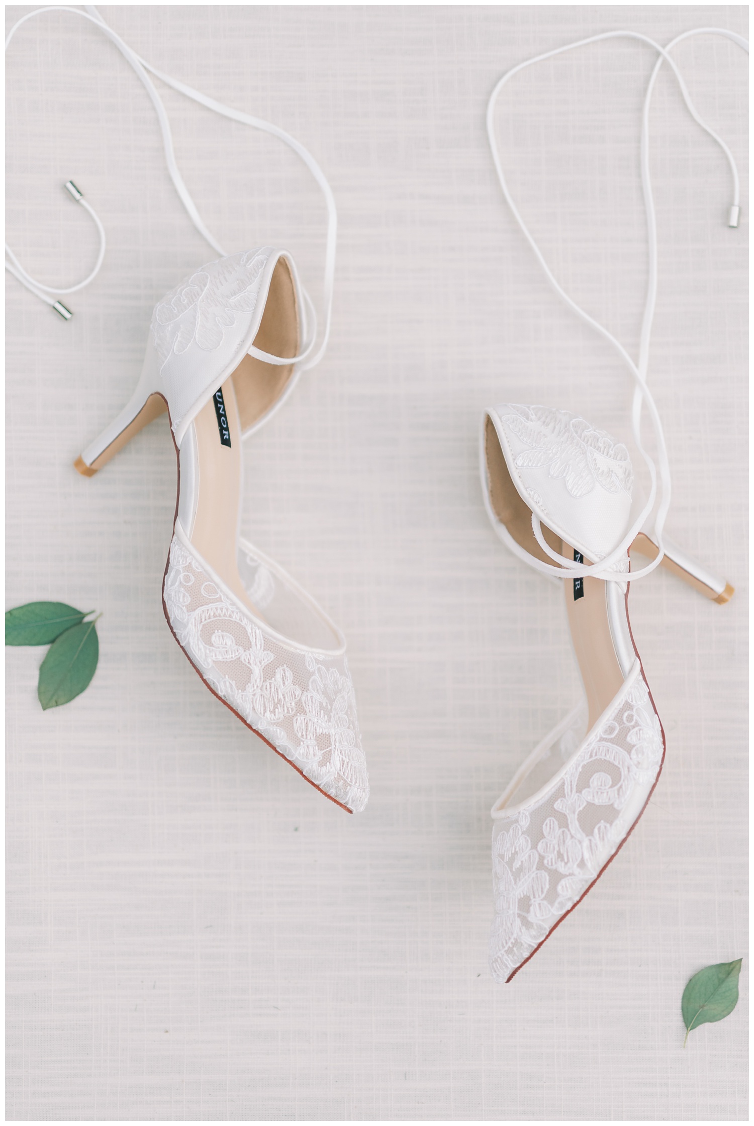 Bride's white lace wedding shoes