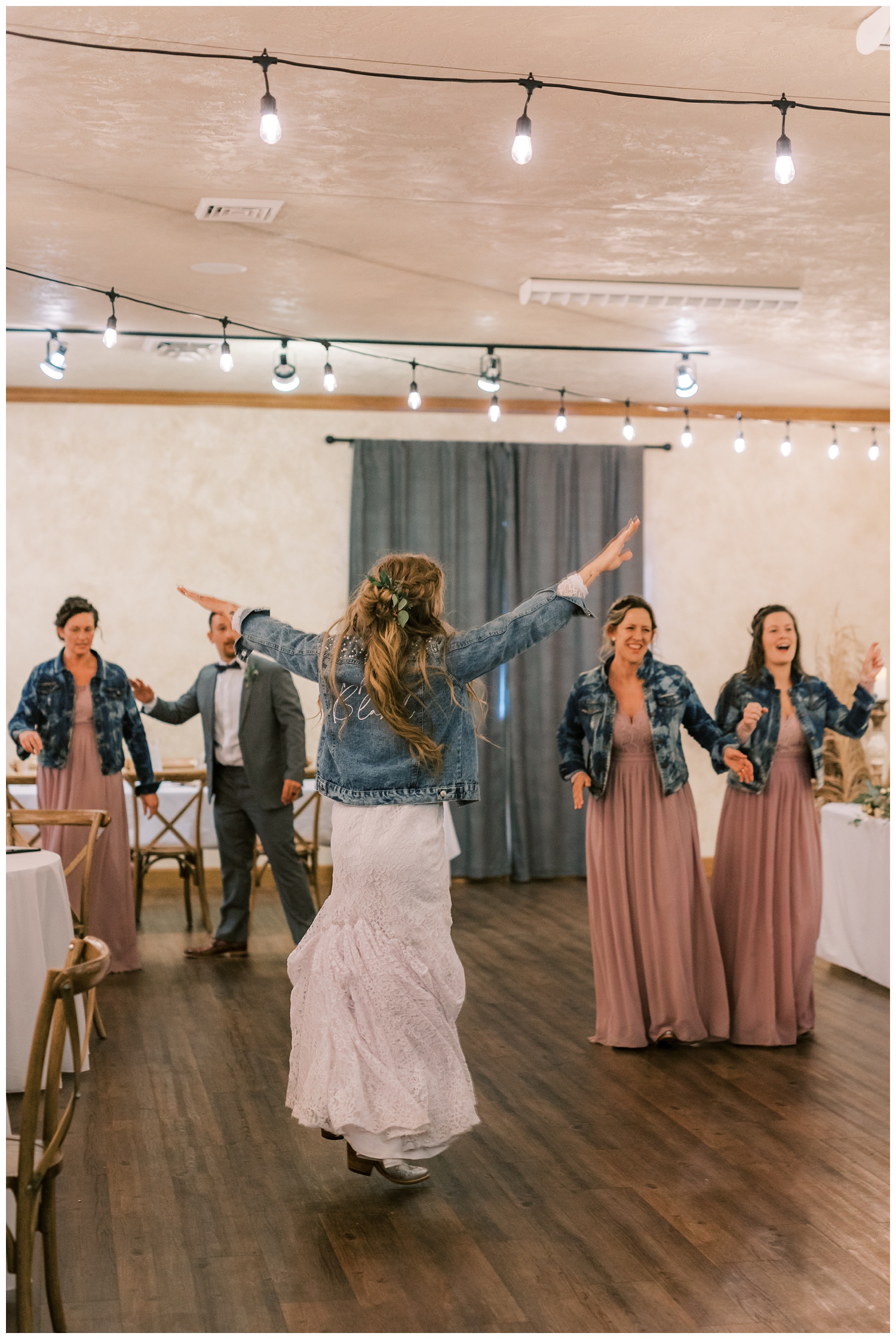 Bride and bridesmaids dancing at Illinois wedding reception