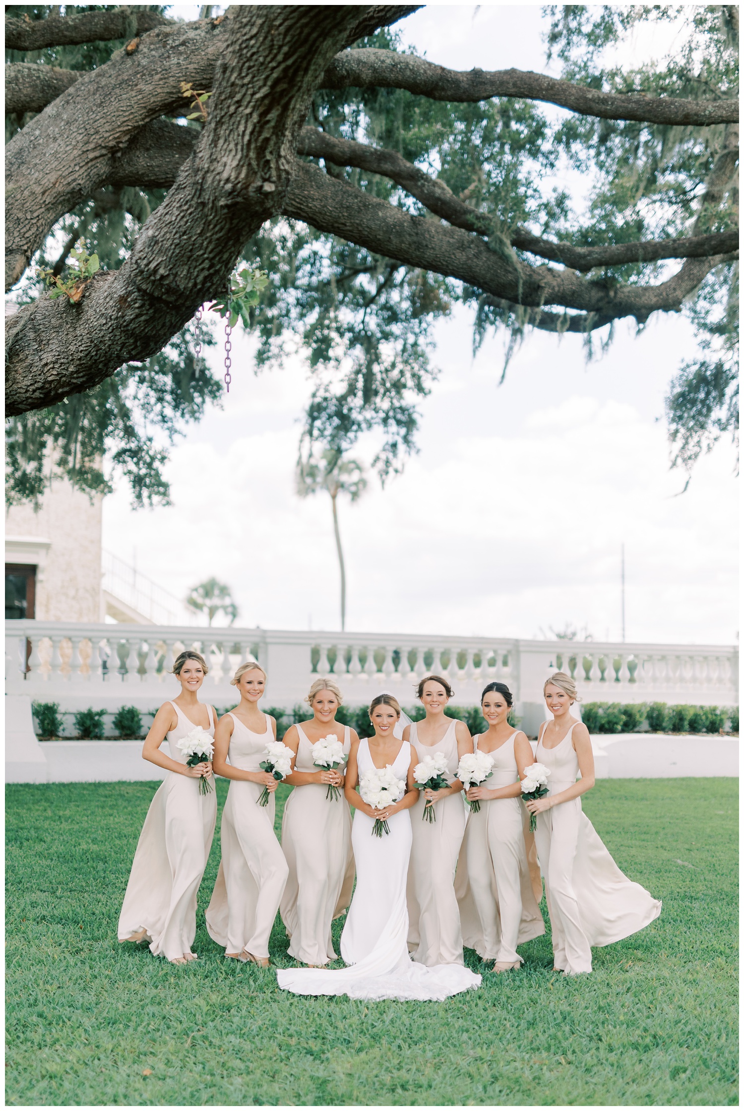 Bridesmaids in champagne David's Bridal gowns
